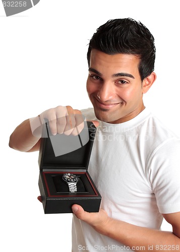 Image of Man or salesman advertising a wristwatch