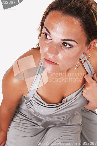 Image of Pretty girl in silver dress.