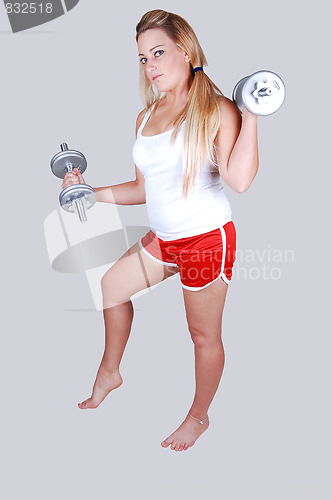 Image of Blond hair woman with dumbbells.