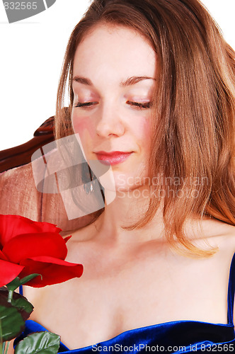 Image of Beautiful woman with red rose.