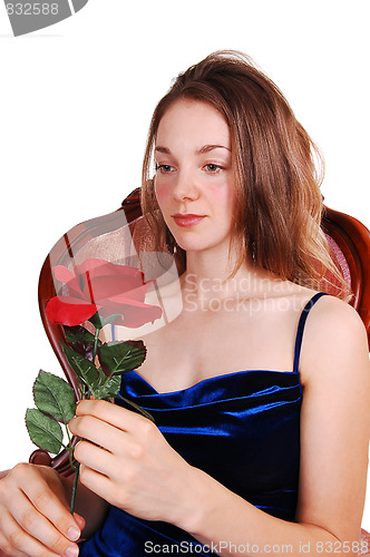 Image of Beautiful woman with red rose.