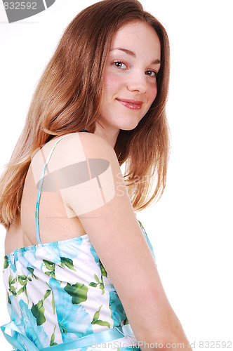 Image of Young lady in blue white dress.