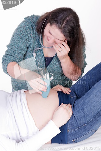 Image of Midwife With Doppler