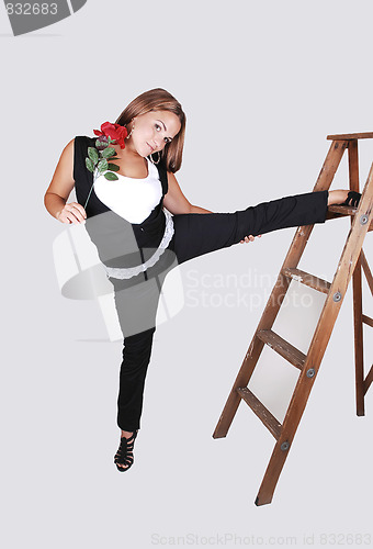 Image of Pretty girl on the stepladder.