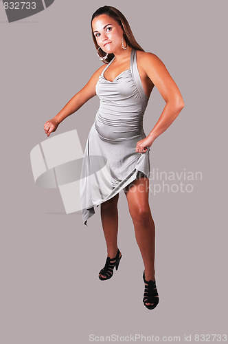 Image of Pretty girl in silver dress.