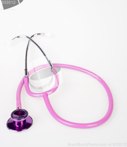 Image of pink stethoscope on white