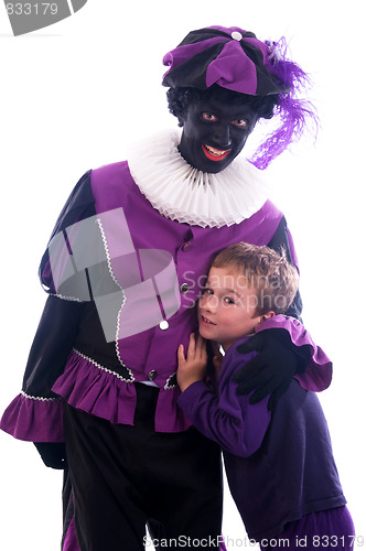 Image of Zwarte Piet with child