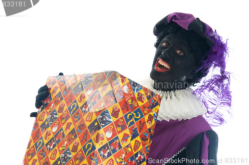 Image of Zwarte Piet with present