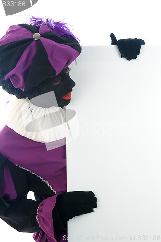 Image of Zwarte Piet looking at a white board, to put your text in.