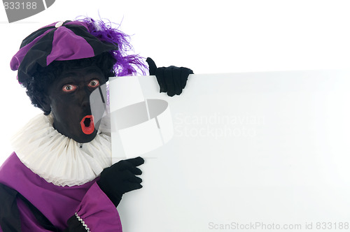 Image of Zwarte Piet looking at a white board, to put your text in.