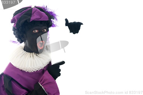 Image of Zwarte Piet looking at a white board, to put your text in.