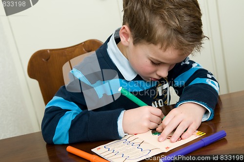Image of Writing And Drawing Boy