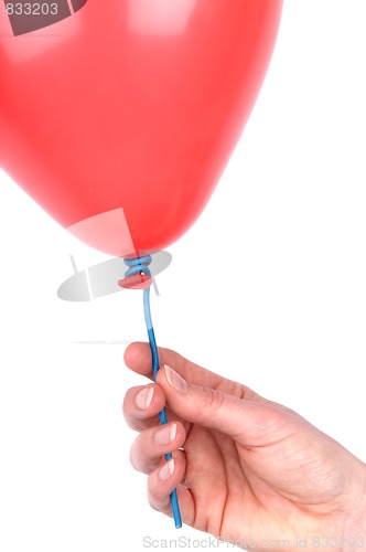 Image of Woman's Hand Holding A Balloon