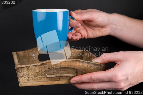 Image of Giving A Cup Of Coffee