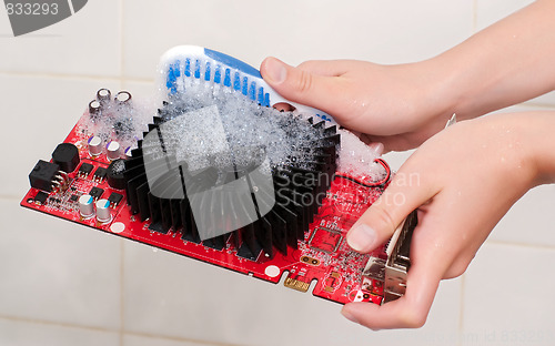 Image of Hands cleaning the cooler