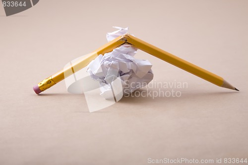 Image of crumpled paper and crushed pencil