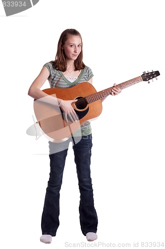 Image of Serious Teen Playing Guitar