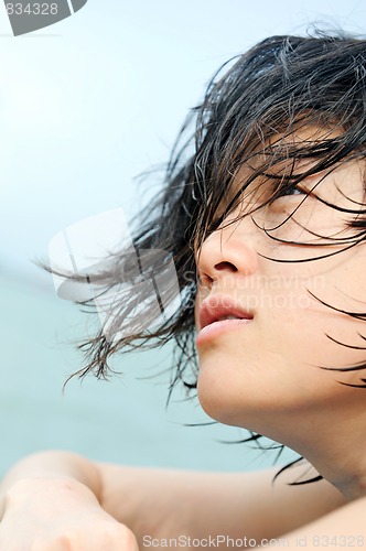 Image of Asian girl with wet hair