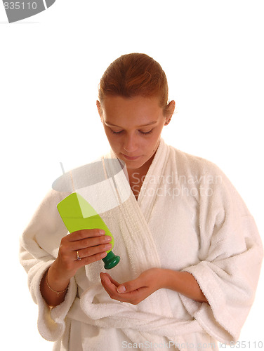 Image of Woman with lotion.