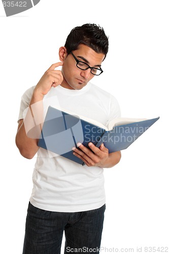 Image of Student reading and thinking