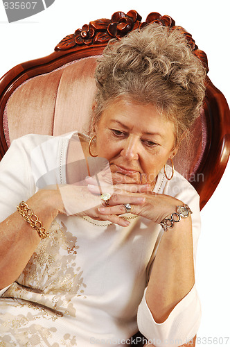 Image of Worried senior woman.