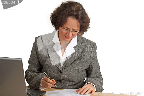 Image of Woman is writng