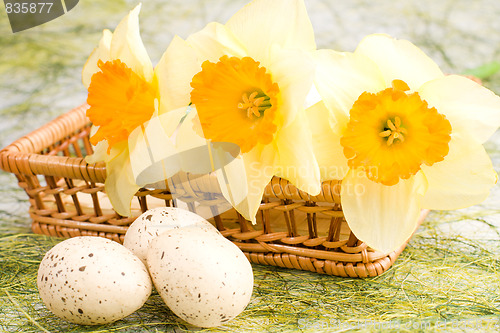 Image of Daffodils in the basket and easter eggs