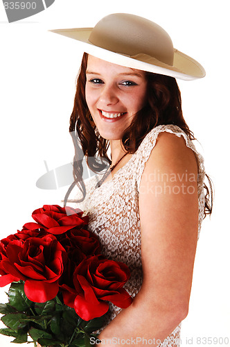 Image of Woman with hat and roses.
