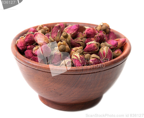 Image of Dry rose in wooden cup