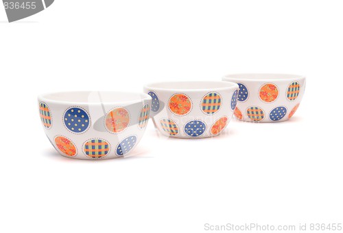 Image of Row of porcelain bowls isolated