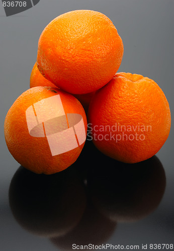 Image of Oranges on a black background