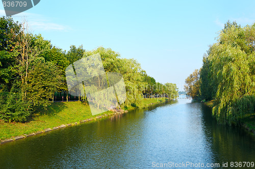 Image of Evening in the park near the lake.