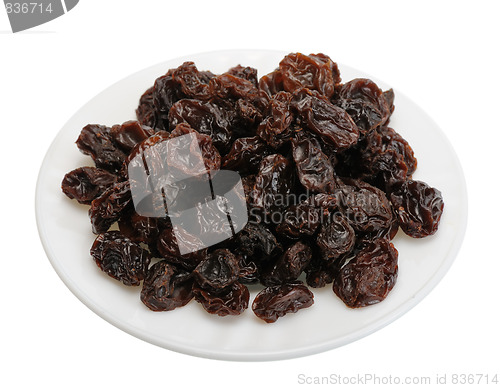 Image of Raisin on a white plate on a white background