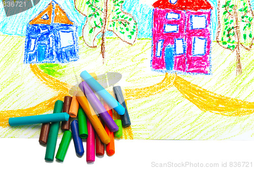 Image of Wax crayons and a children's drawing.