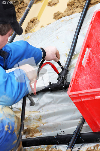 Image of A geothermal heating system is built.