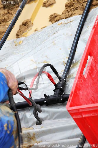 Image of A geothermal heating system is built.