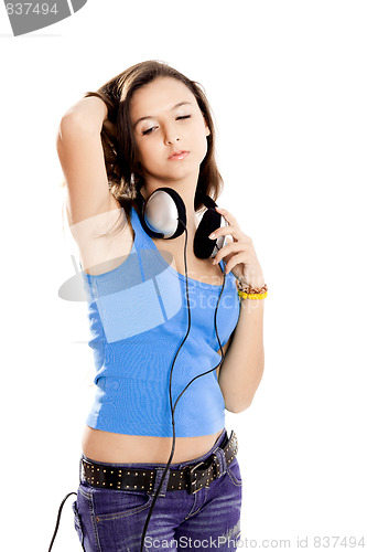 Image of Young girl listen music