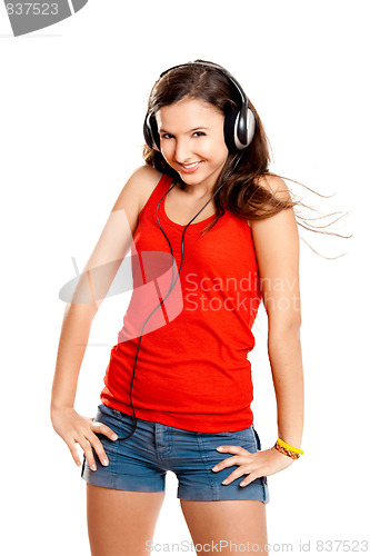 Image of Young girl listen music