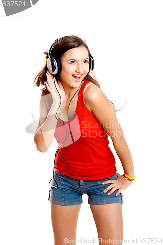 Image of Young girl listen music