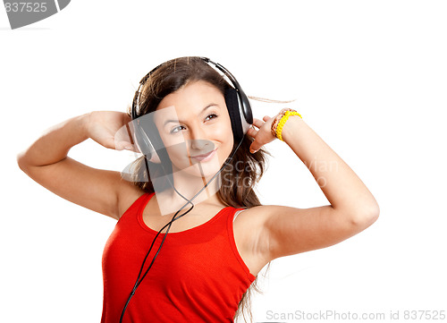 Image of Young girl listen music