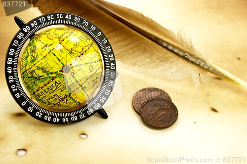 Image of Antique globe and feather