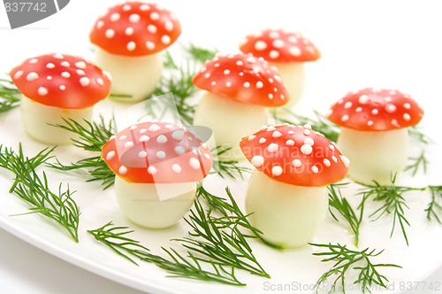 Image of Mushrooms made of eggs and tomatos