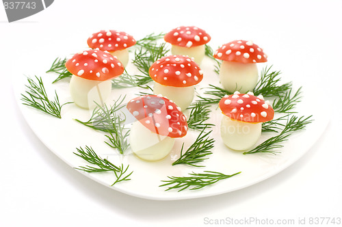 Image of Mushrooms made of eggs and tomatos