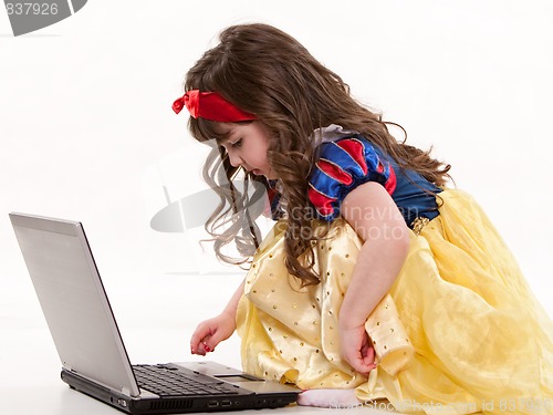 Image of Young cute caucasian toddler girl playing 