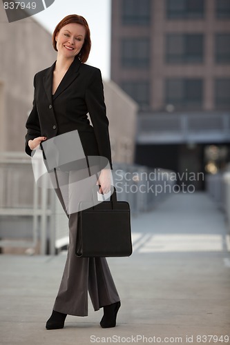 Image of Attractive middle age caucasian businesswoman