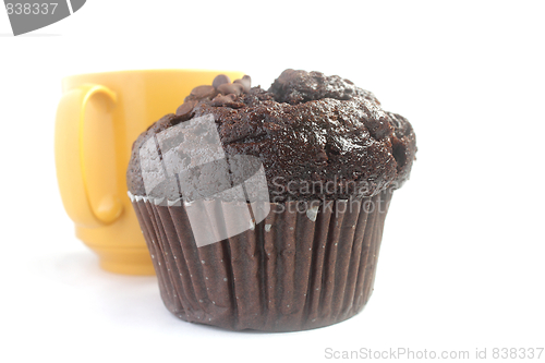 Image of Chocolate muffin and yellow cup