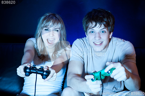 Image of Couple playing video games