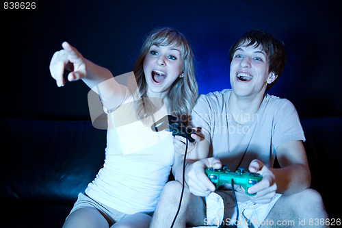 Image of Couple playing video games