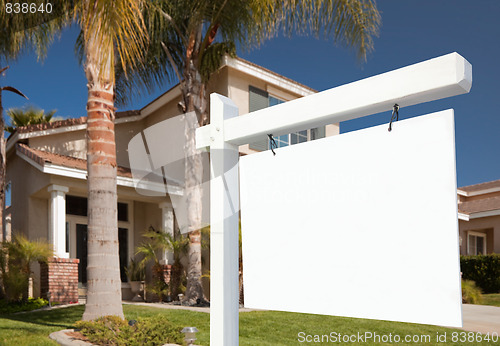 Image of Blank Real Estate Sign and Home