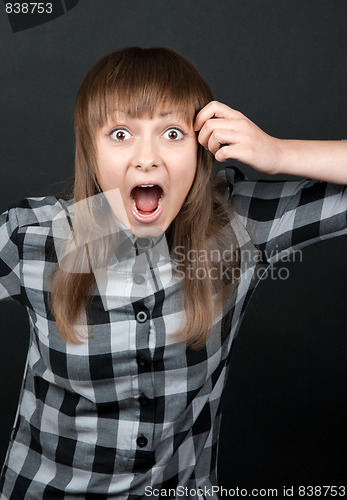 Image of Beautiful girl yells